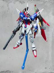 702943 B